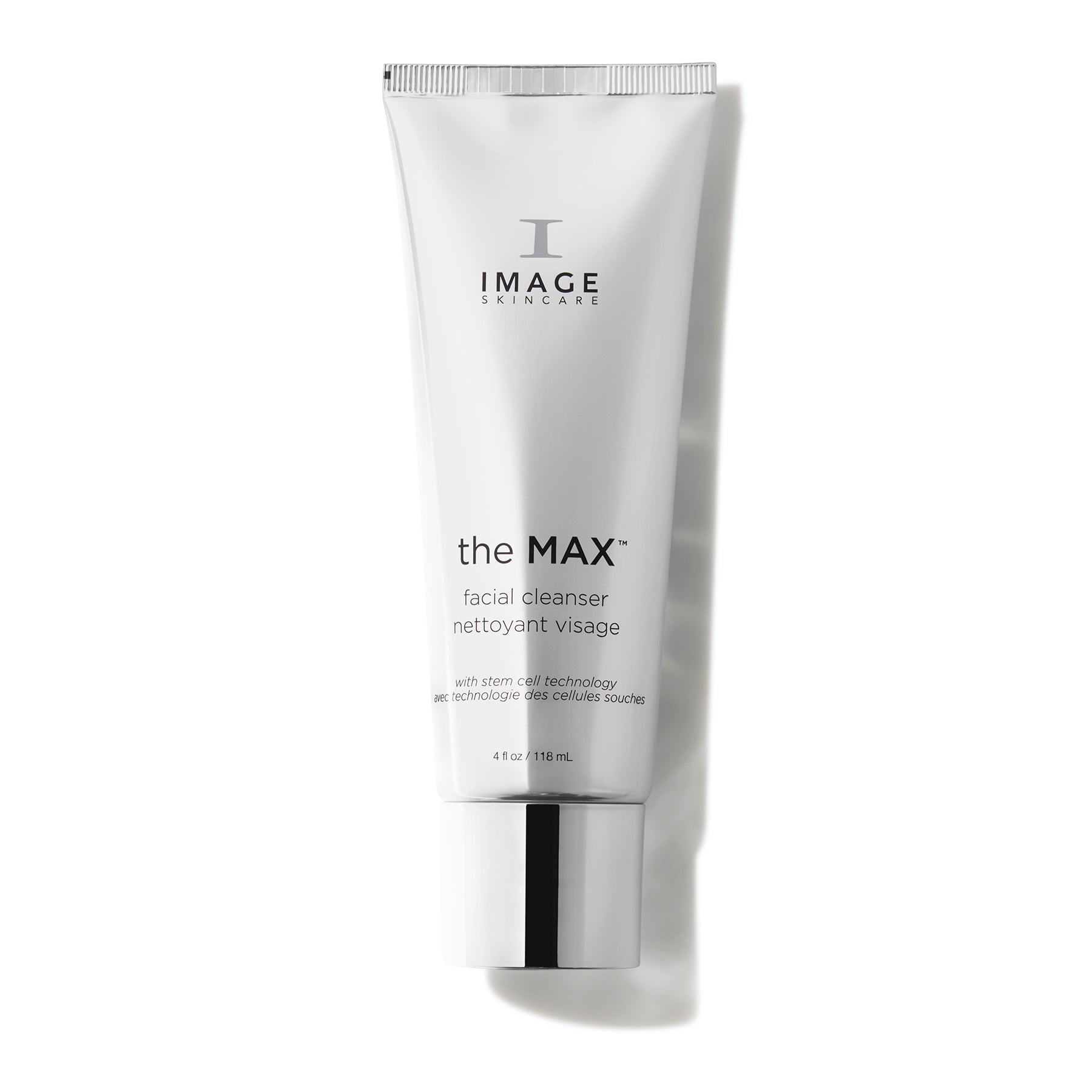 Foaming facial cleanser tube standing on a plain background