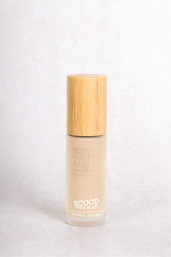 Liquid foundation bottle with pump in a beige shade