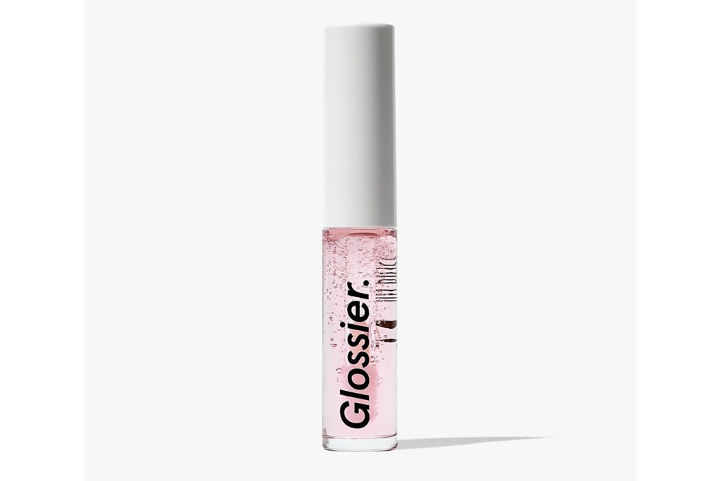 Clear pink lip gloss in a white tube on a white background