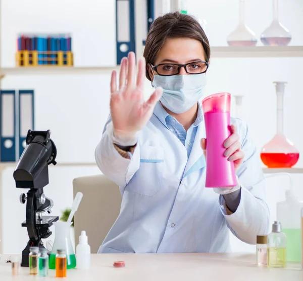 Formulation lab bench with cosmetic textures and sample containers