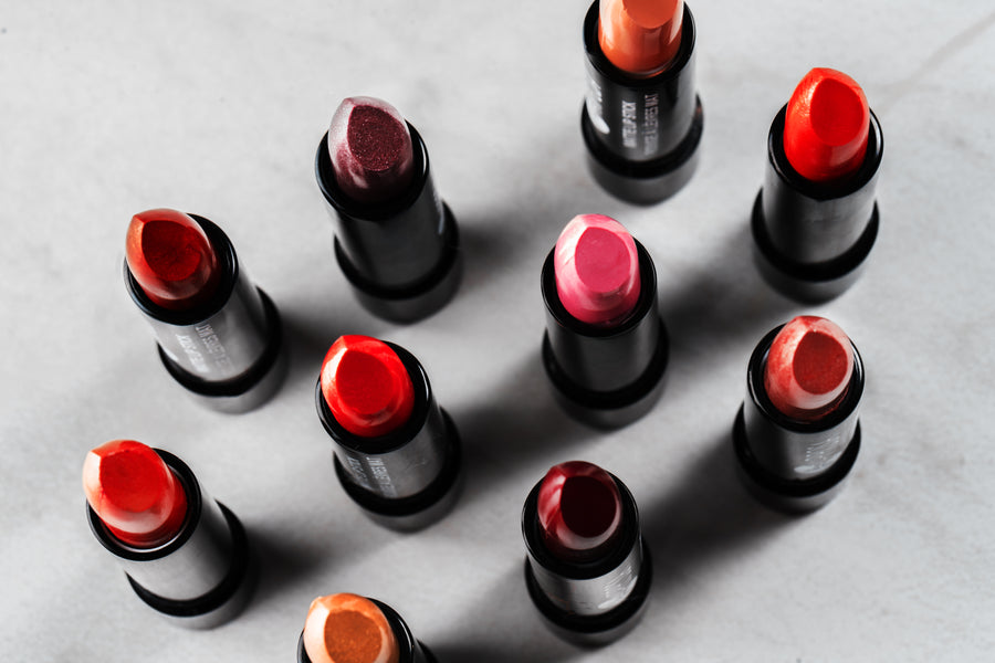 Lipstick bullets viewed from above in red, pink and metallic shades